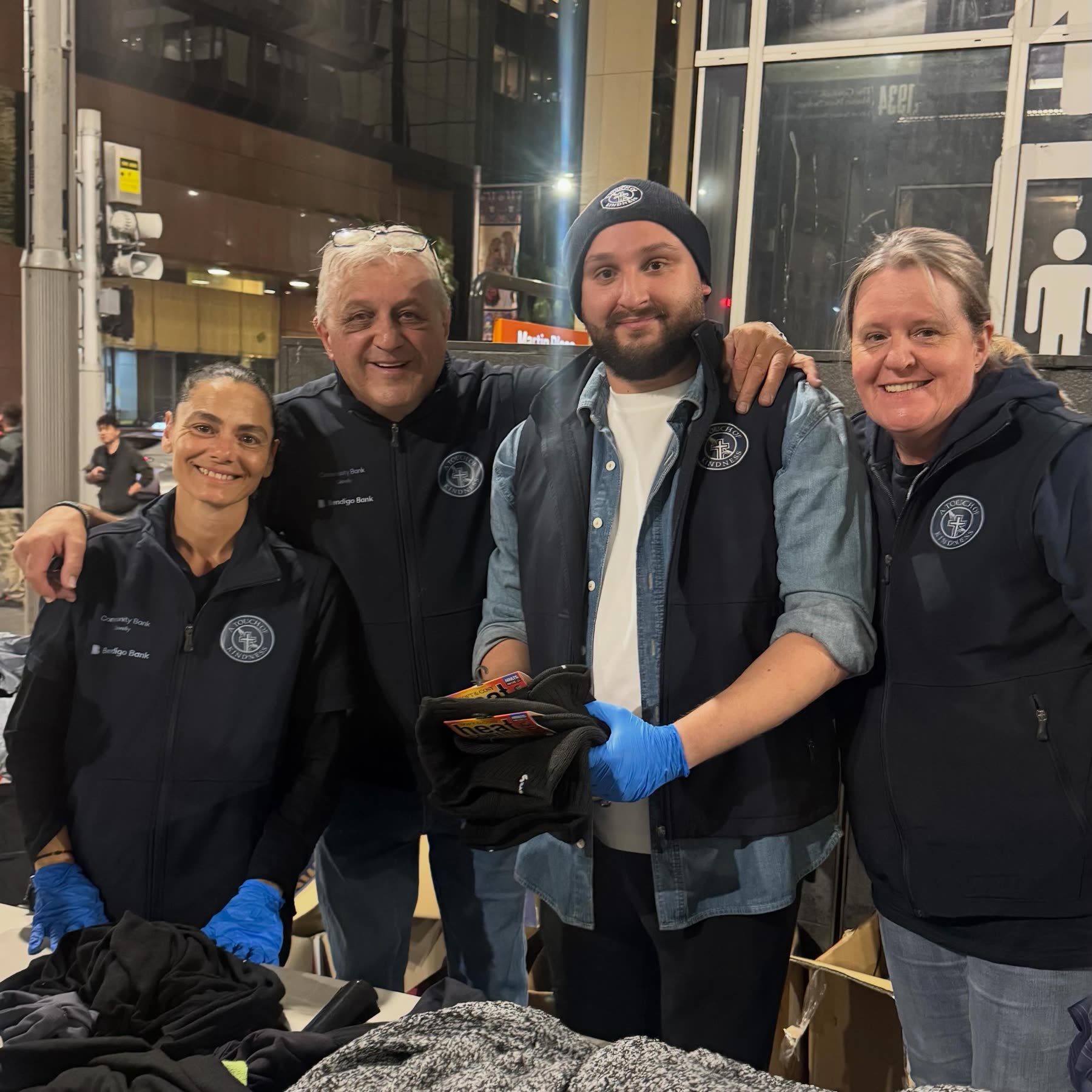 Volunteers sorting warm clothing to hand out