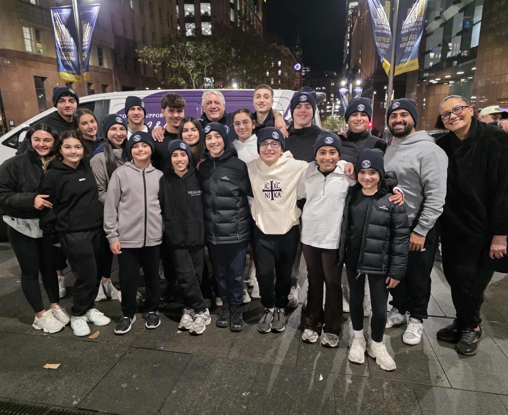 A large group of volunteers gathered at Martin Place at night